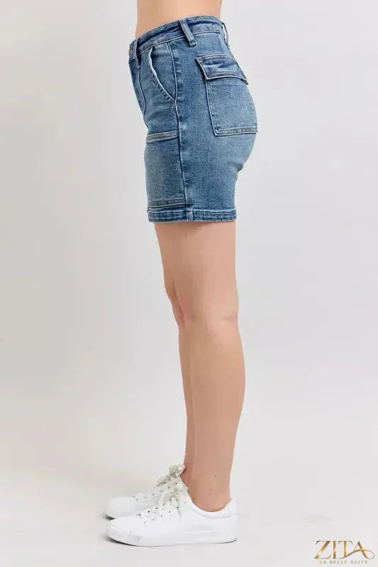 Zita La Belle Elite Judy Blue high rise denim shorts in plus size, showcasing front view with frayed hem and classic blue denim fabric.
