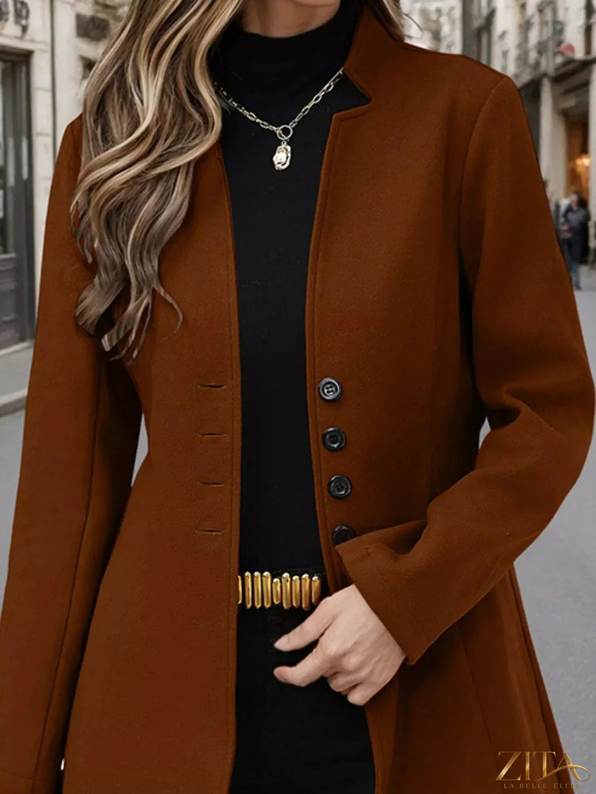 Zita La Belle Elite button-up long sleeve coat in neutral fabric, shown on a hanger with front view and collar detail.