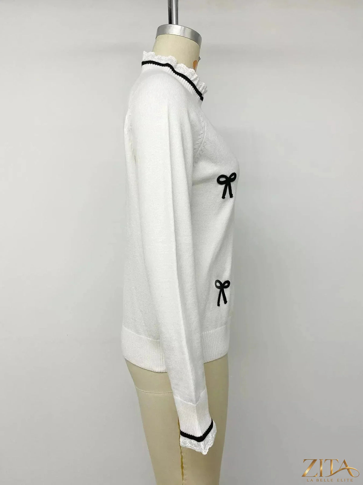 Zita La Belle Elite Bow-Embellished Lace Trim Sweater featuring delicate lace details and elegant bow accents.