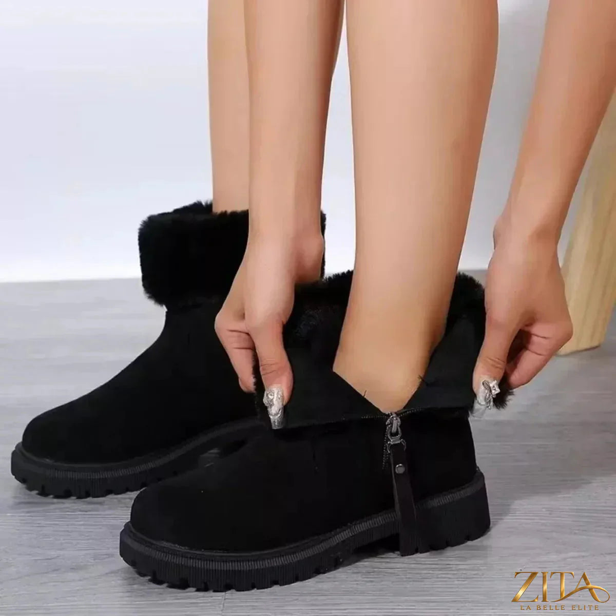 Zita La Belle Elite faux fur lined side-zip chunky platform ankle boots showing black leather exterior and thick soles.