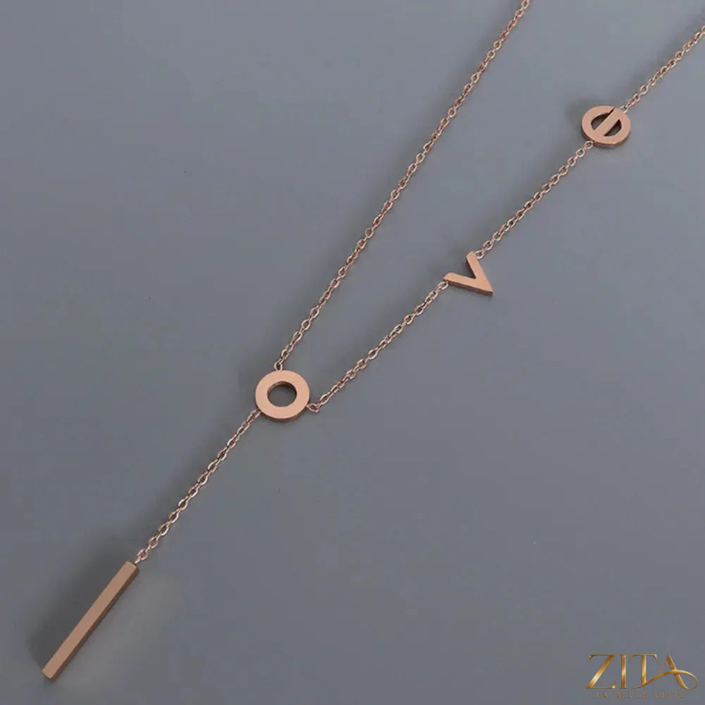 Titanium steel letter necklace with a sleek chain, featuring a pendant with a personalized letter, by Zita La Belle Elite.