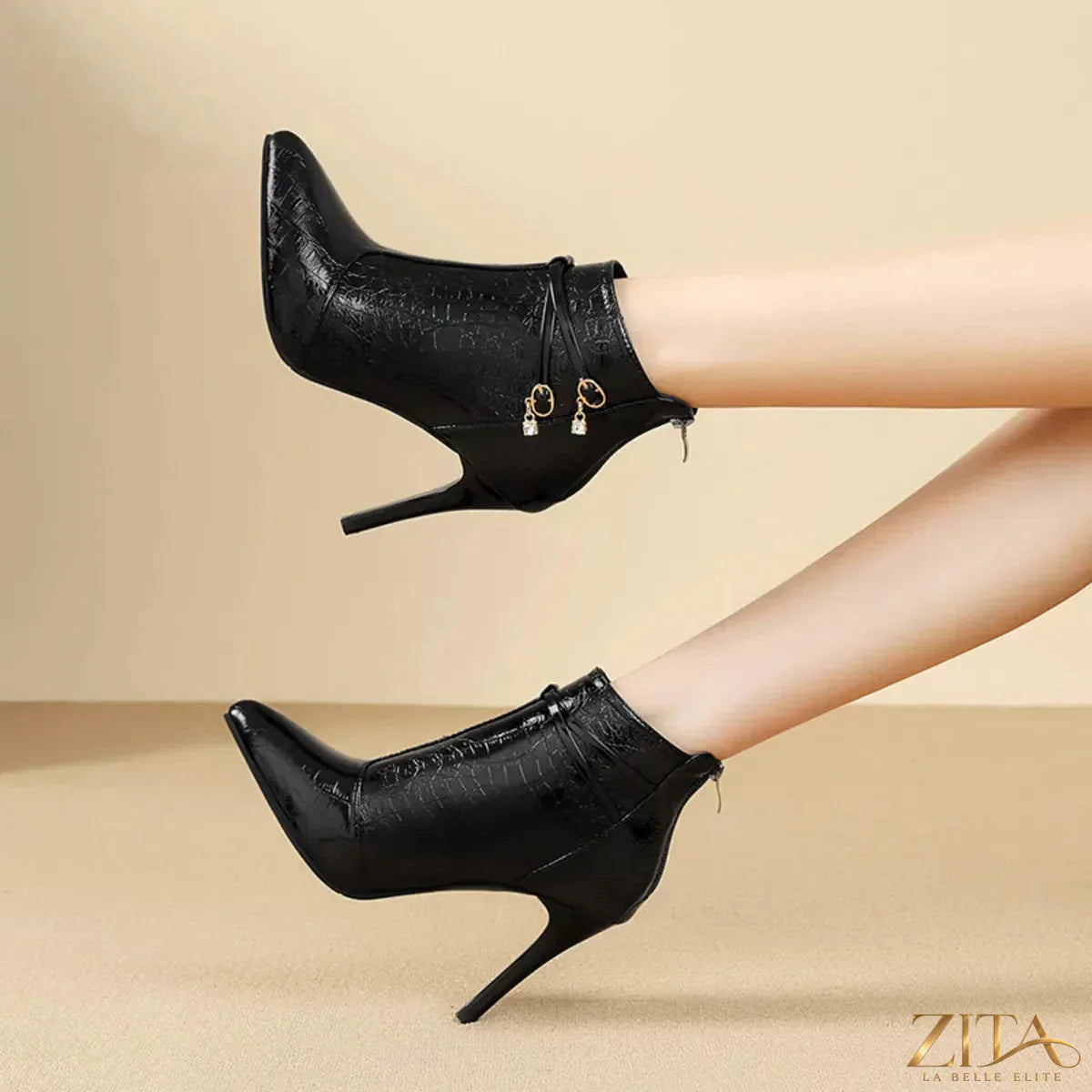 Point toe stiletto boots by Zita La Belle Elite featuring sleek black design and high heel, stylish footwear for elegant occasions.