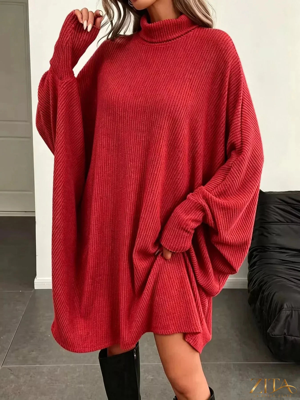 Zita La Belle Elite oversized batwing sleeve ribbed knit turtleneck dress in black, featuring a relaxed fit and ribbed texture.