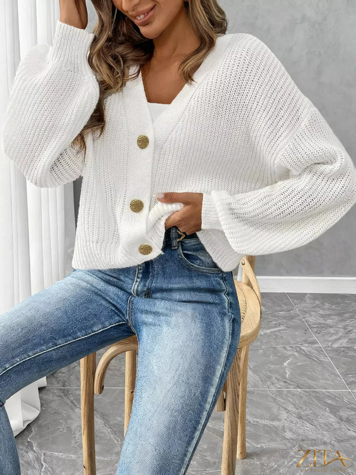 Elegant V-neck button-down ribbed knit cardigan by Zita La Belle Elite displayed on a model, showcasing a fitted, stylish design.