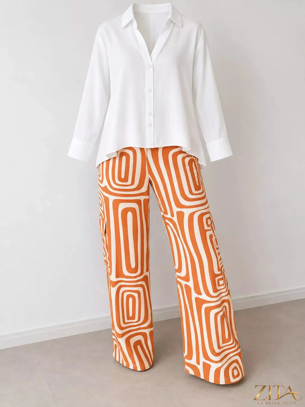 Plus size Zita La Belle Elite button-down shirt and geometric wide-leg pants set displayed on a model, showcasing stylish matching ensemble.