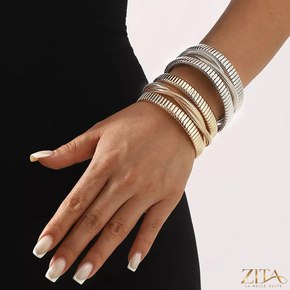 Multi-layered open bracelet by Zita La Belle Elite featuring delicate silver chains and stylish layered design.