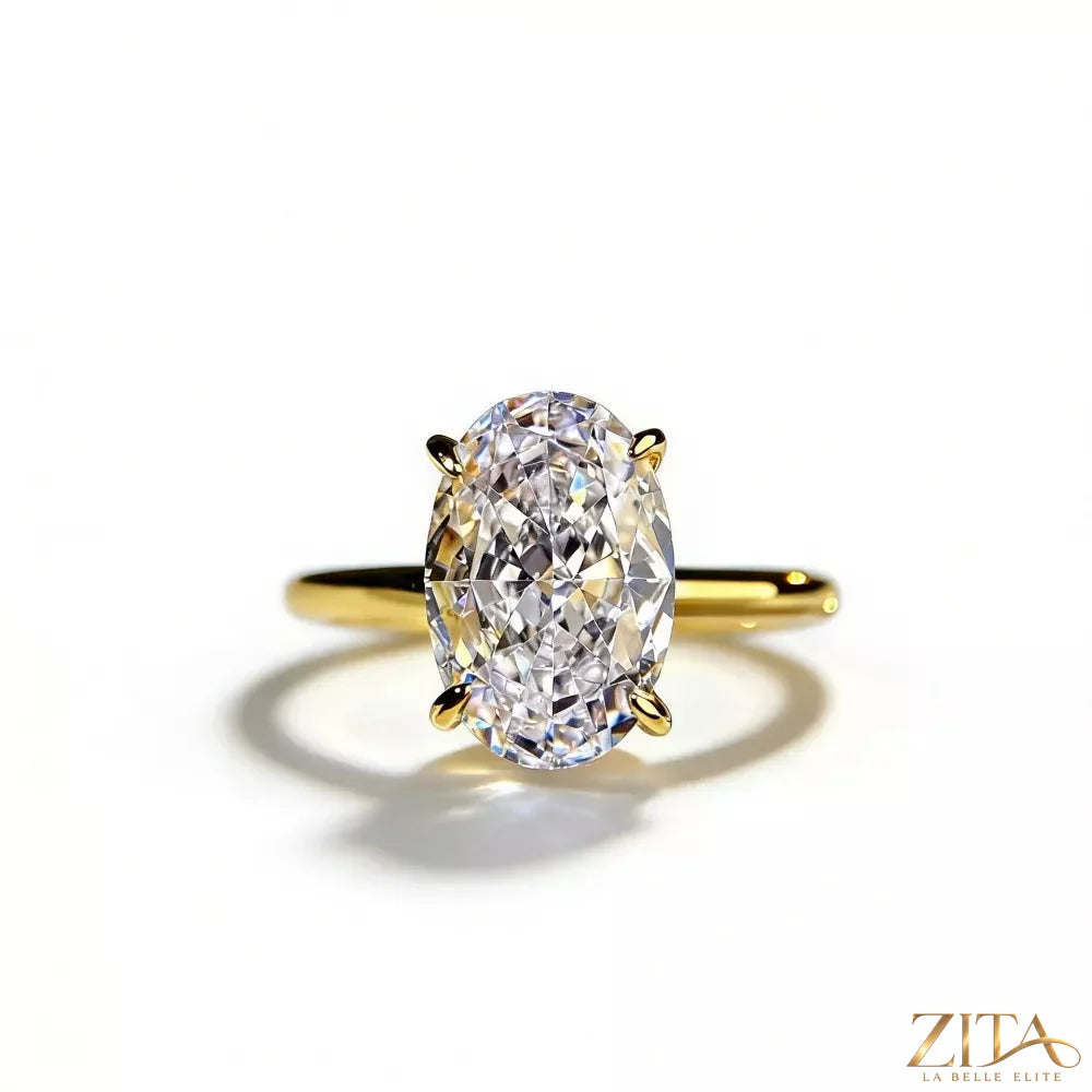 18K gold-plated zircon ring by Zita La Belle Elite featuring sparkling zircon stones and a sleek band design.