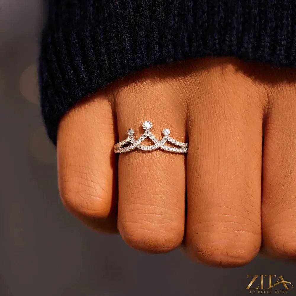 Sterling silver ring with a crown-shaped design inlaid with sparkling zircon stones, crafted by Zita La Belle Elite.
