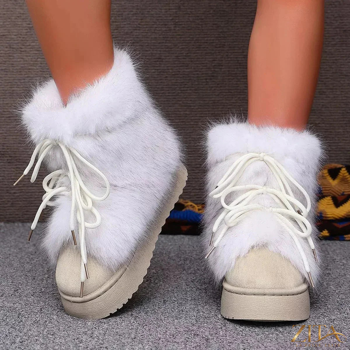 Zita La Belle Elite winter faux fur trimmed lace-up boots with stylish design and warm fur accents on a dark background