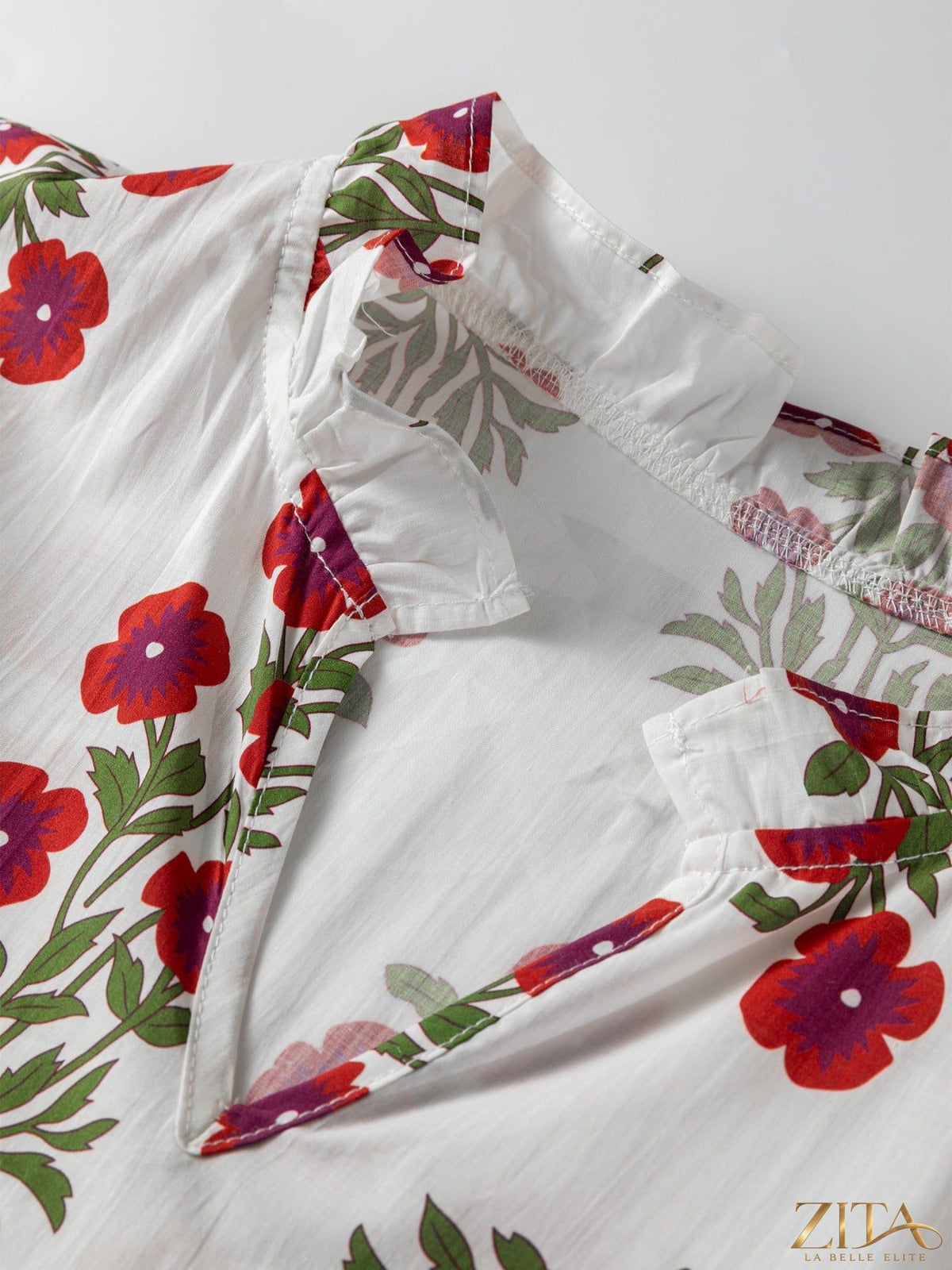 Zita La Belle Elite floral print casual mini dress with short sleeves and a fitted waist, perfect for summer outings.