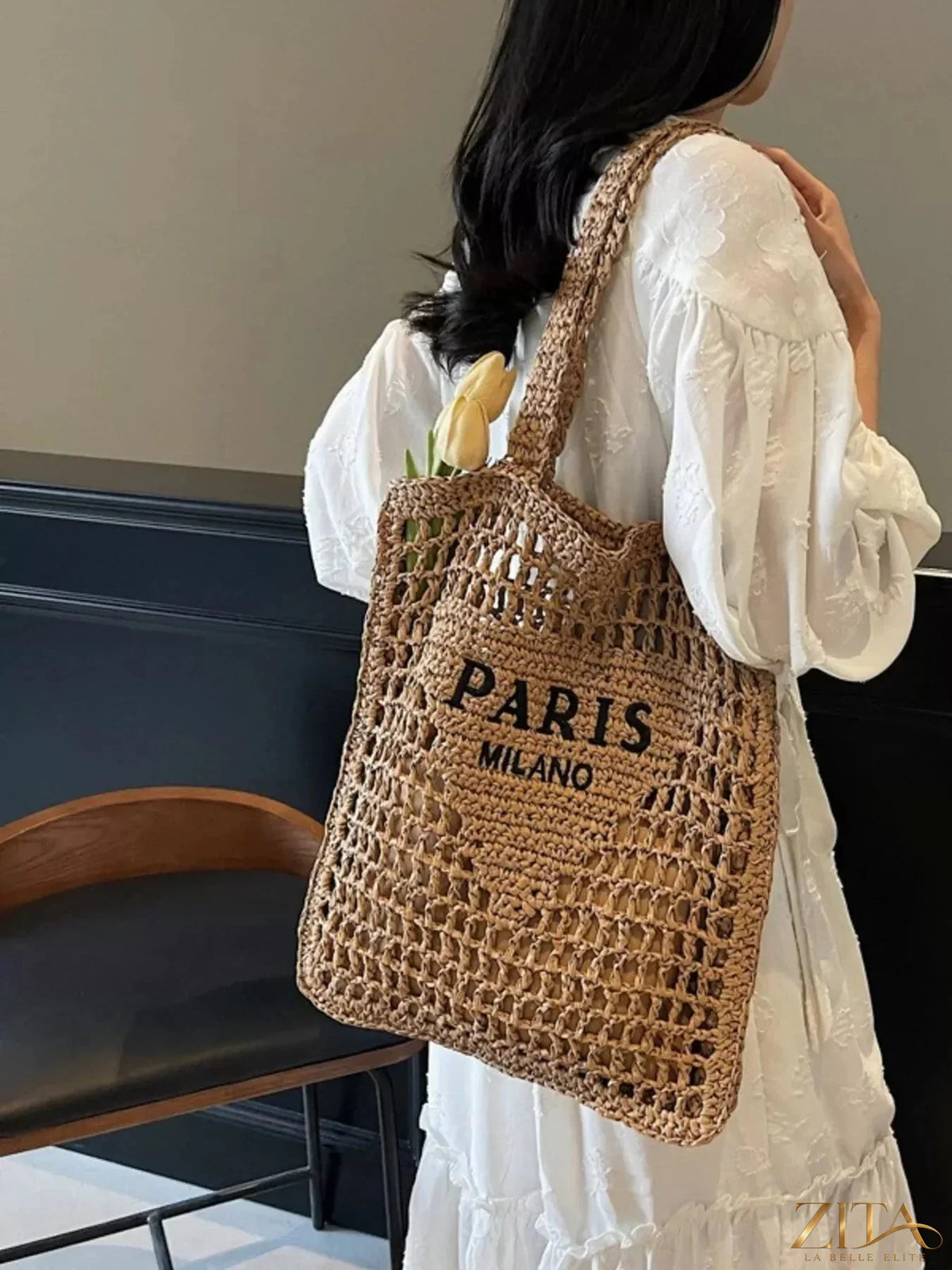 Crochet knit shoulder bag by Zita La Belle Elite featuring a stylish, textured design and a comfortable shoulder strap.