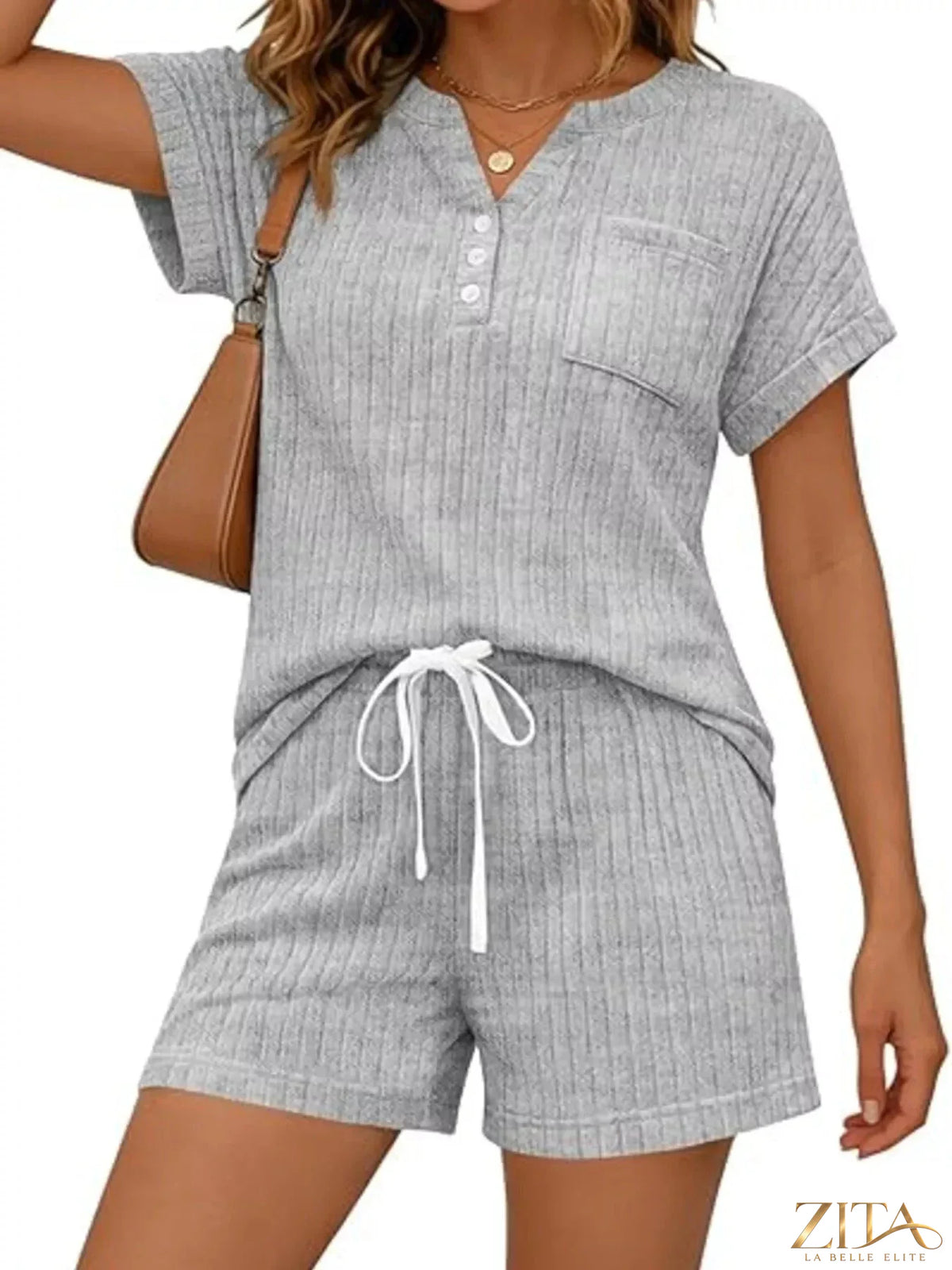 Casual ribbed knit tee and shorts set from Trendsi, featuring a comfortable, stylish matching outfit in soft fabric.