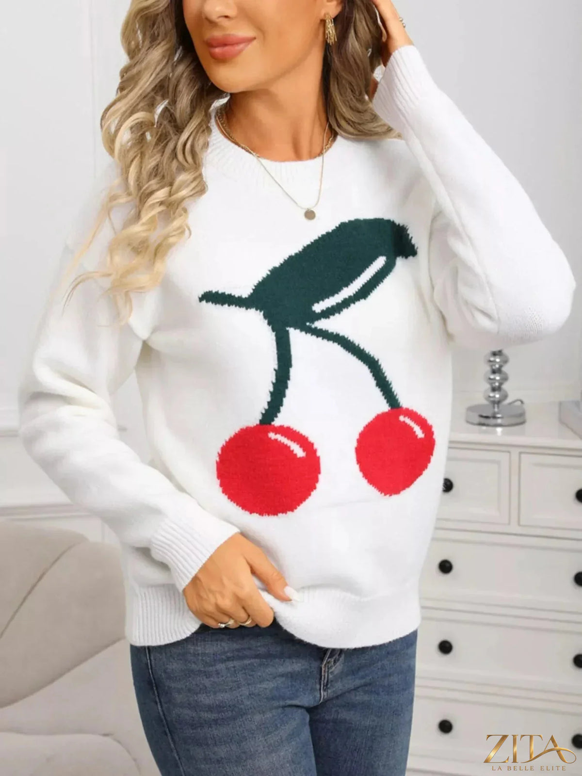 Cherry-colored round neck sweater by Trendsi, featuring a soft knit fabric and classic fit, displayed on a neutral background.