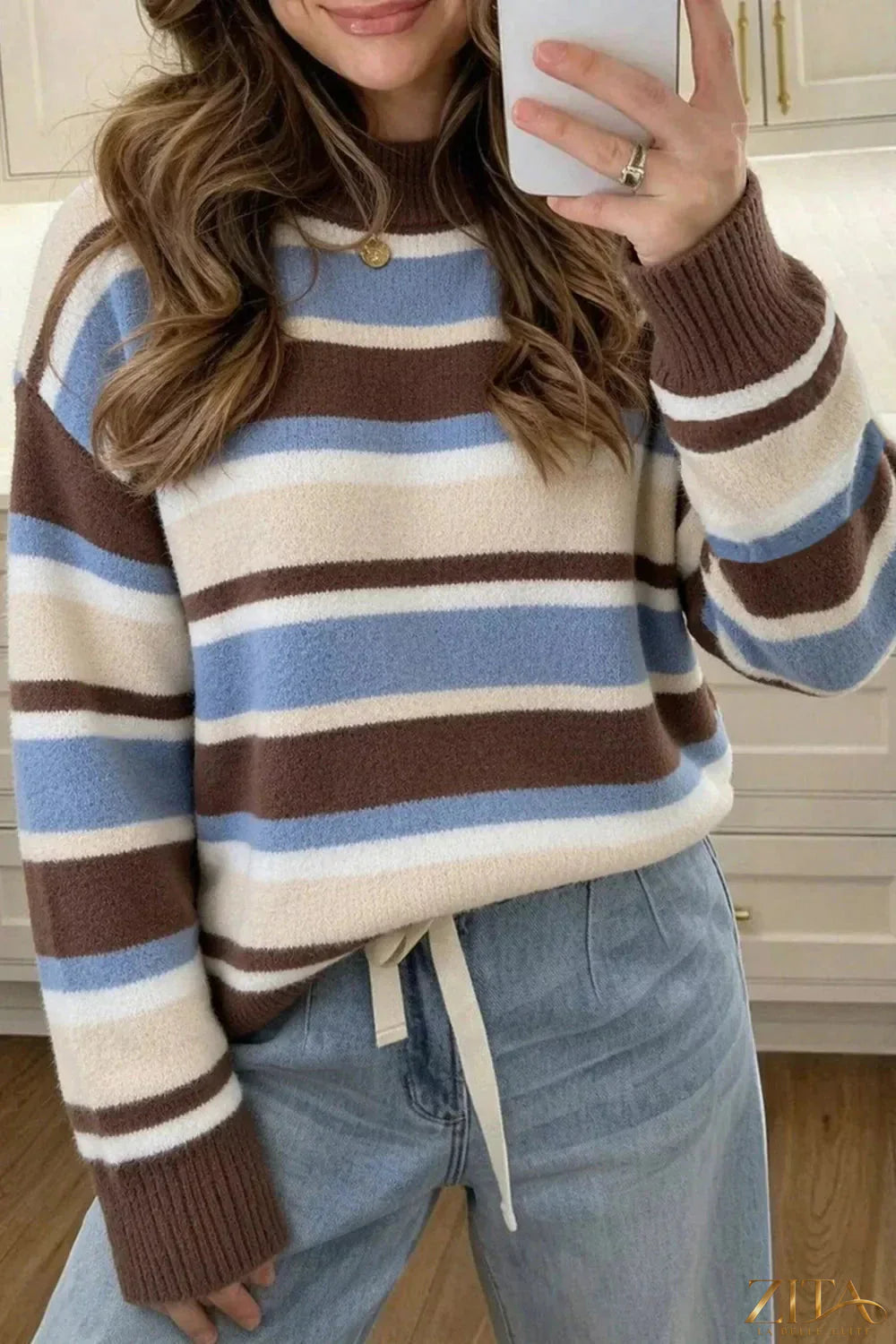 Zita La Belle Elite striped dropped shoulder sweater featuring multicolored horizontal stripes and a relaxed fit.