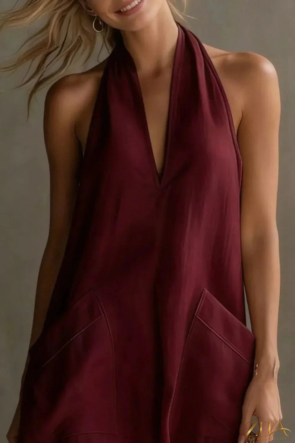 Casual halter neck pocket midi dress by Zita La Belle Elite, featuring a relaxed fit and side pockets in a stylish design.