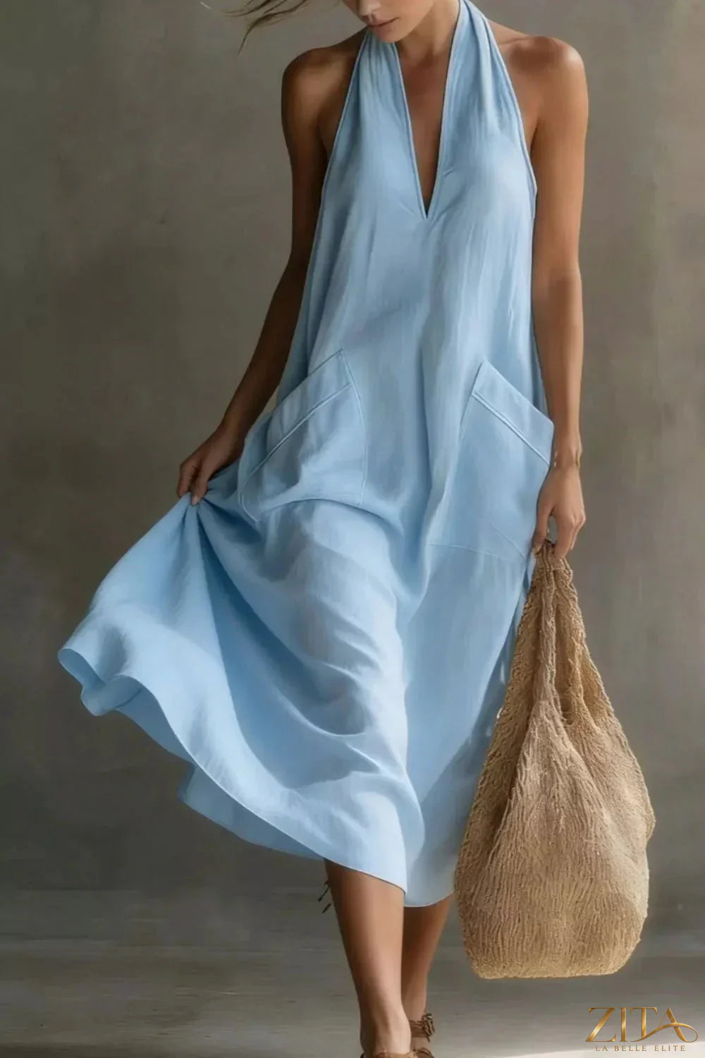 Casual Zita La Belle Elite halter neck midi dress with pockets, featuring a relaxed fit and stylish design.