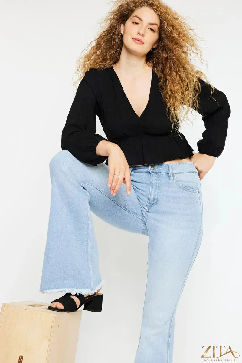 Zita La Belle Elite Kancan high rise curvy flare jeans displayed on a model, showcasing their fit and stylish design.