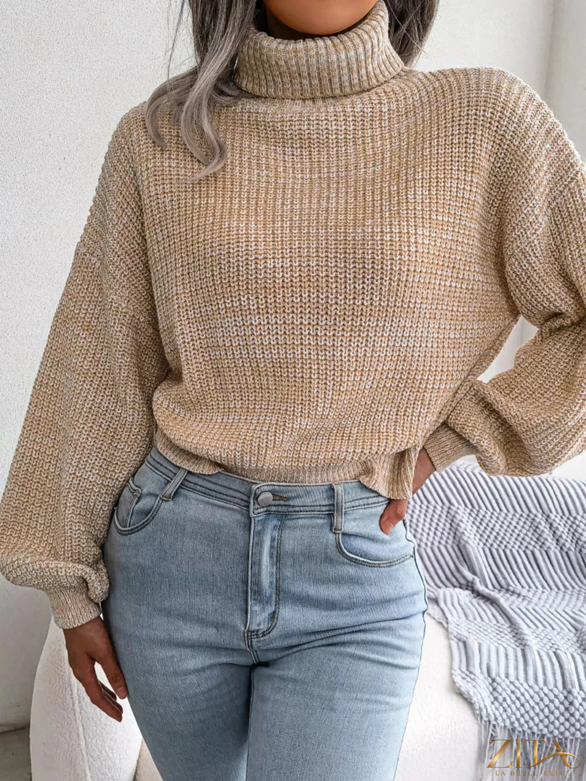 Cream turtleneck dropped shoulder sweater by Trendsi, featuring a cozy, relaxed fit with ribbed cuffs and neckline.
