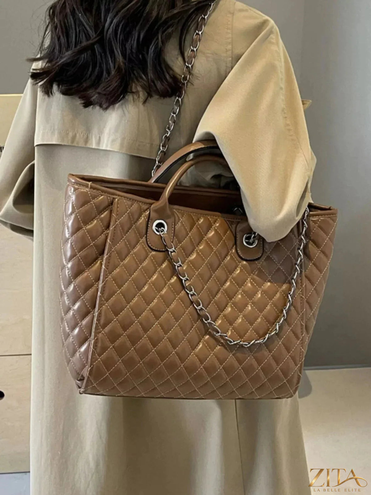 Zita La Belle Elite quilted chain shoulder bag with gold-tone hardware and a sleek, padded quilted design for stylish carry.