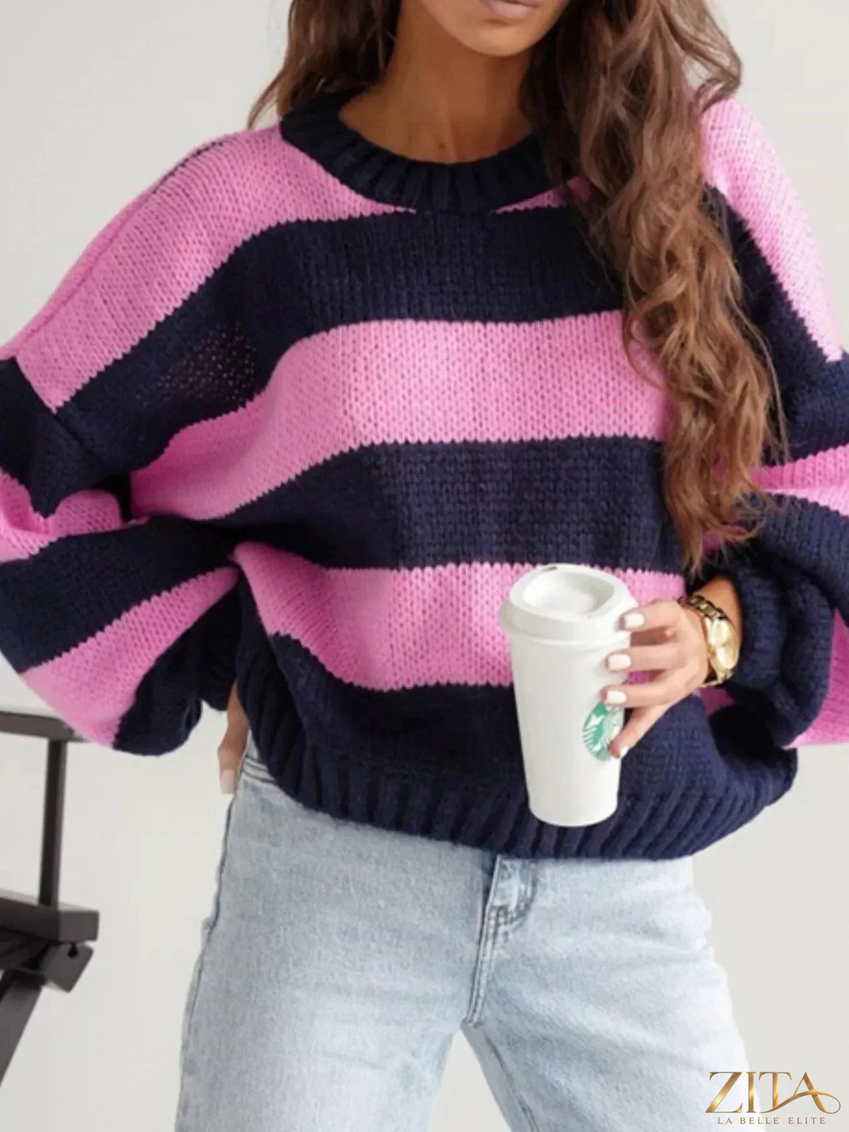 Striped dropped shoulder sweater from Trendsi featuring a cozy knit with wide stripes and relaxed fit.