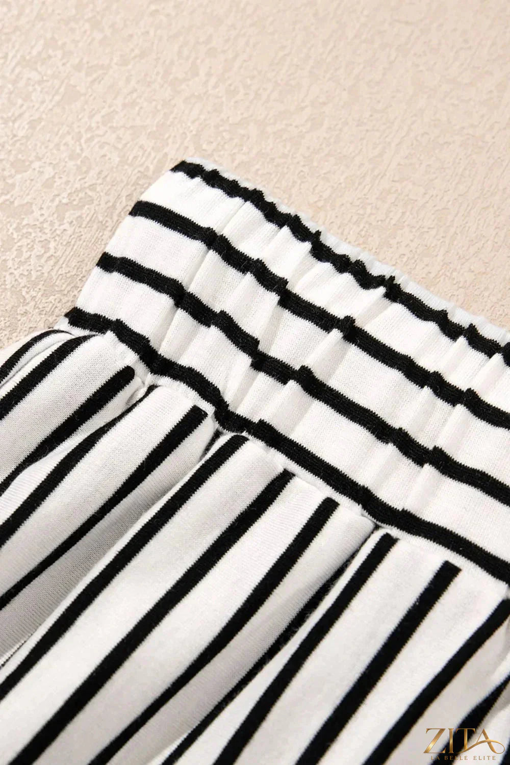 Trendsi Stripe V-neck T-shirt and casual shorts set, two-piece outfit for women, featuring a striped tee and comfortable shorts.
