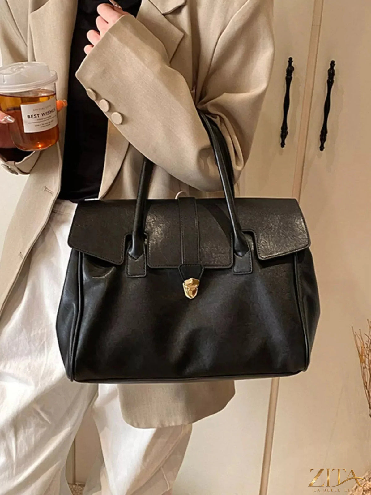 Trendsi Buckle PU Leather Handbag featuring a sleek design, gold buckle detail, and adjustable strap for versatile style.
