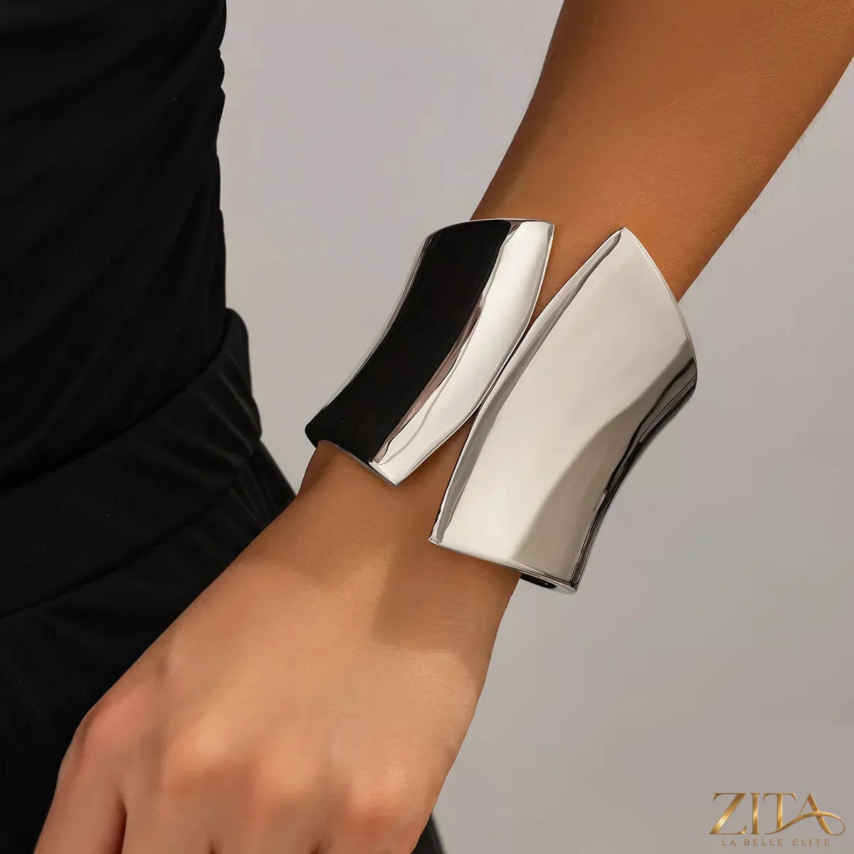 Wide cuff bracelet by Zita La Belle Elite featuring a sleek, modern design in polished metal.