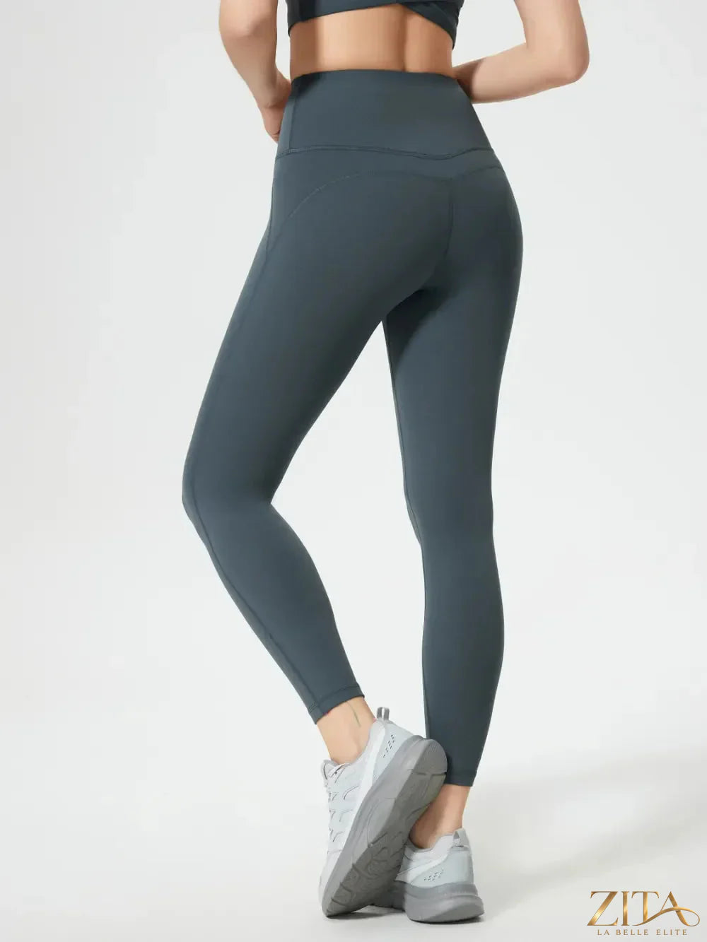 Millennia wide waistband active leggings by Trendsi, black stretchy leggings with comfortable fit and sleek design.