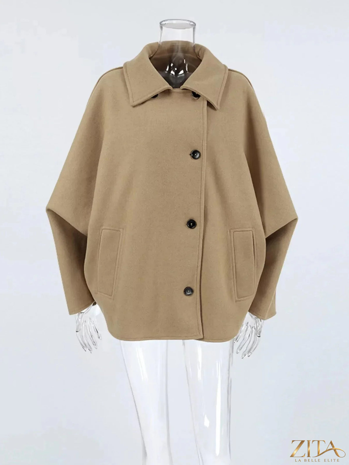 Zita La Belle Elite oversized lapel collar button-down coat displayed on a hanger, showcasing its stylish collar and classic design.
