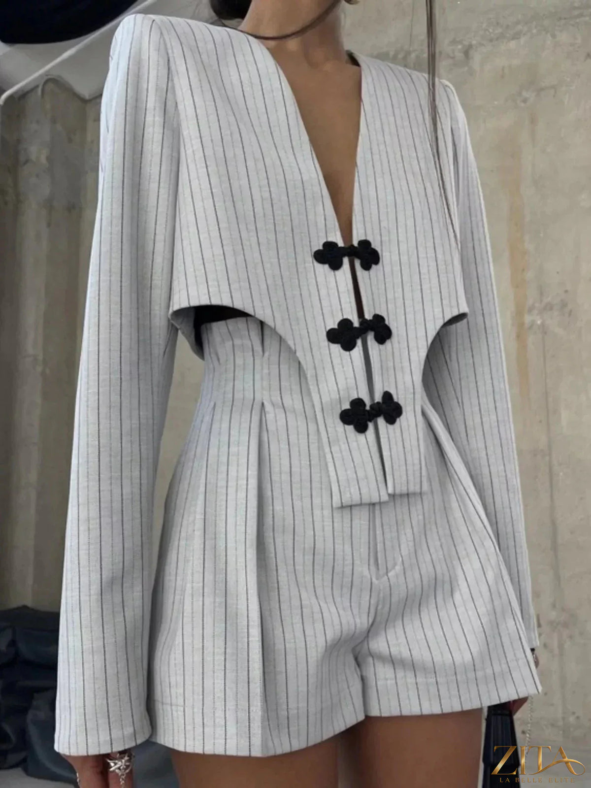Zita La Belle Elite pinstripe cropped blazer and pleated shorts set, stylish women's fashion ensemble with tailored fit and sophisticated design.