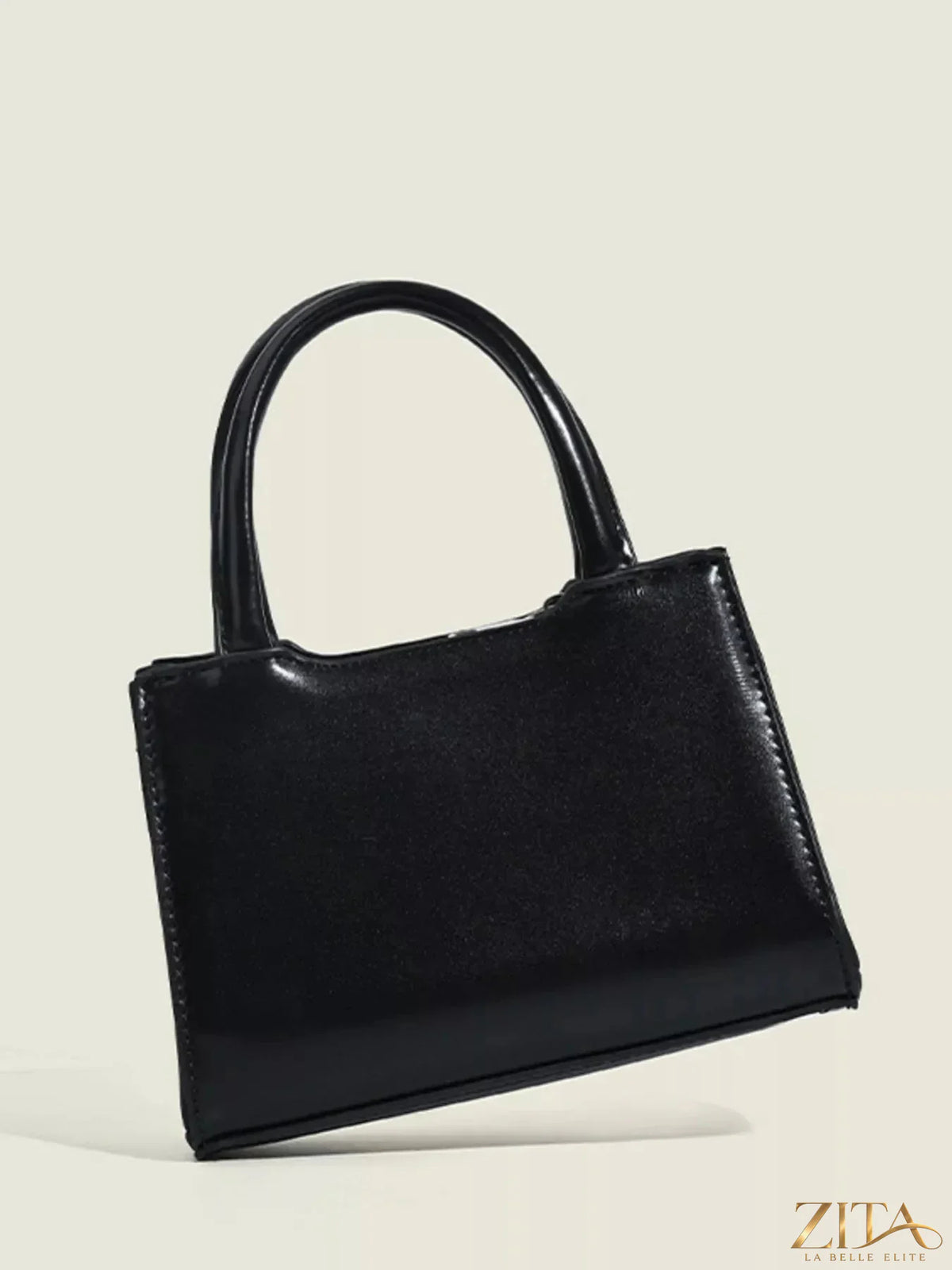 Zita La Belle Elite Bow Decor Top Handle Handbag in black with a stylish bow detail and elegant top handle.