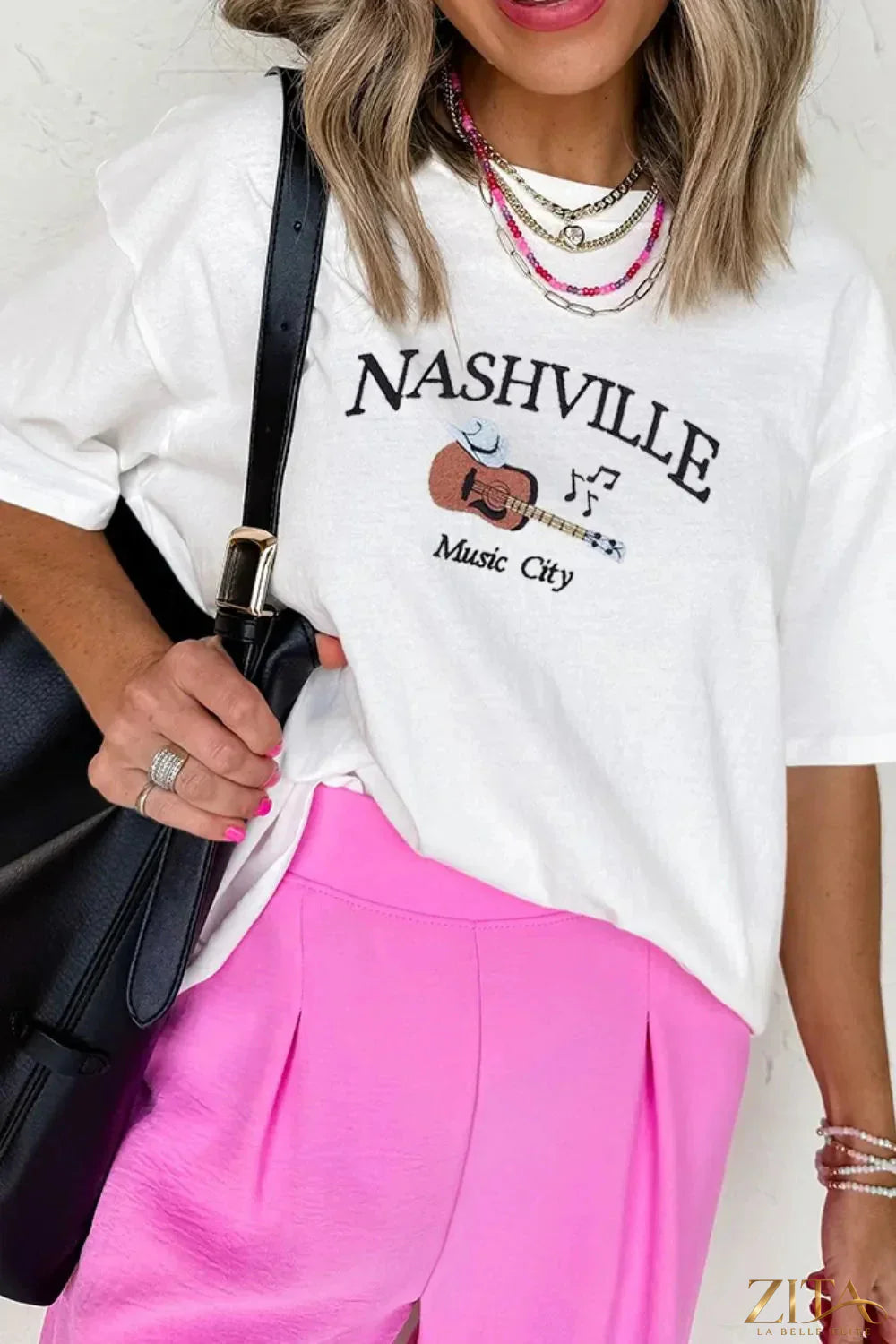 Nashville Music City guitar print crewneck T-shirt by Trendsi, featuring a musical guitar graphic on a casual crewneck tee.