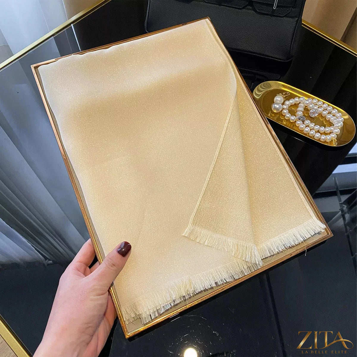 Raw hem scarf from Trendsi featuring soft fabric and a stylish raw edge design, perfect for adding a chic touch to your outfit.