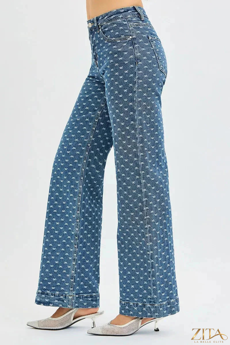 Zita La Belle Elite RISEN high rise wide leg jeans with embroidered bow details and distressed accents on denim fabric