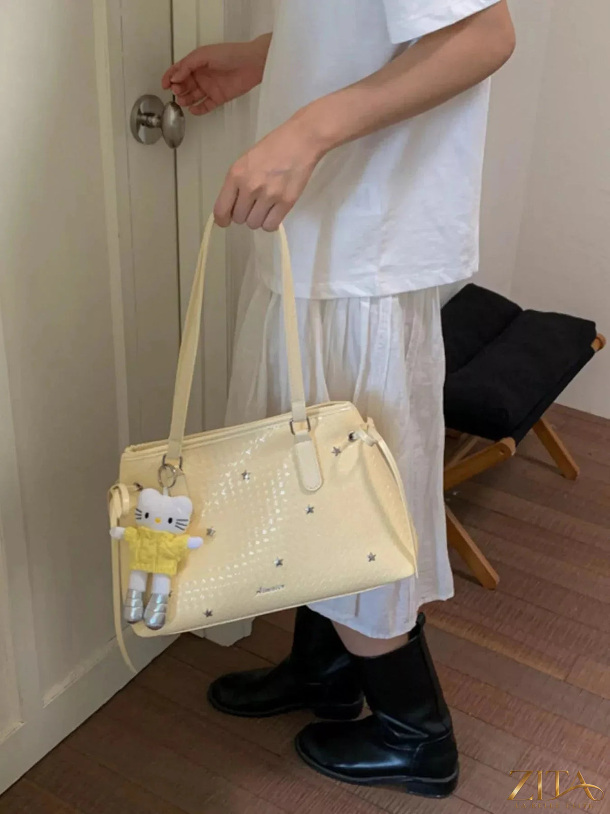 Zita La Belle Elite PU leather convertible tote bag with sleek design, showing its structured shape and adjustable handles.
