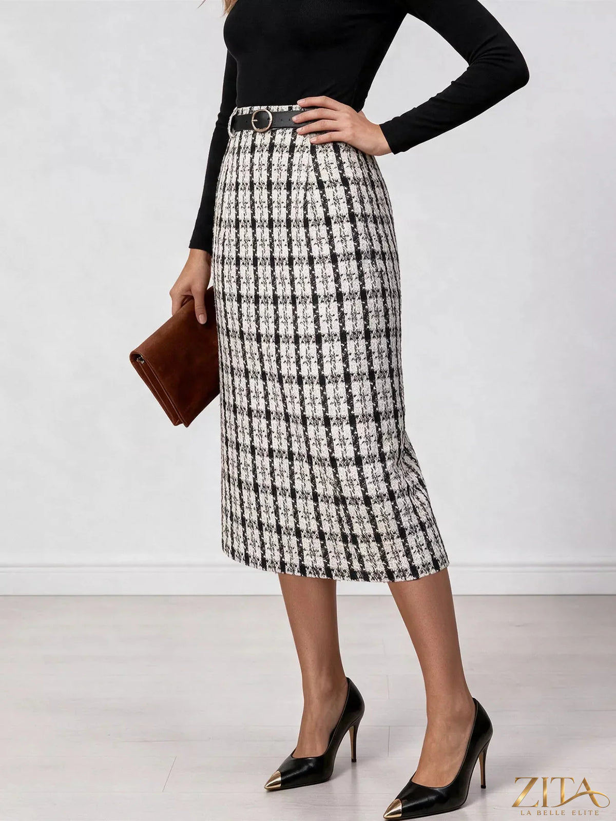 Zita La Belle Elite high-waisted tweed plaid midi skirt displayed on a model, showcasing its stylish design and classic pattern.