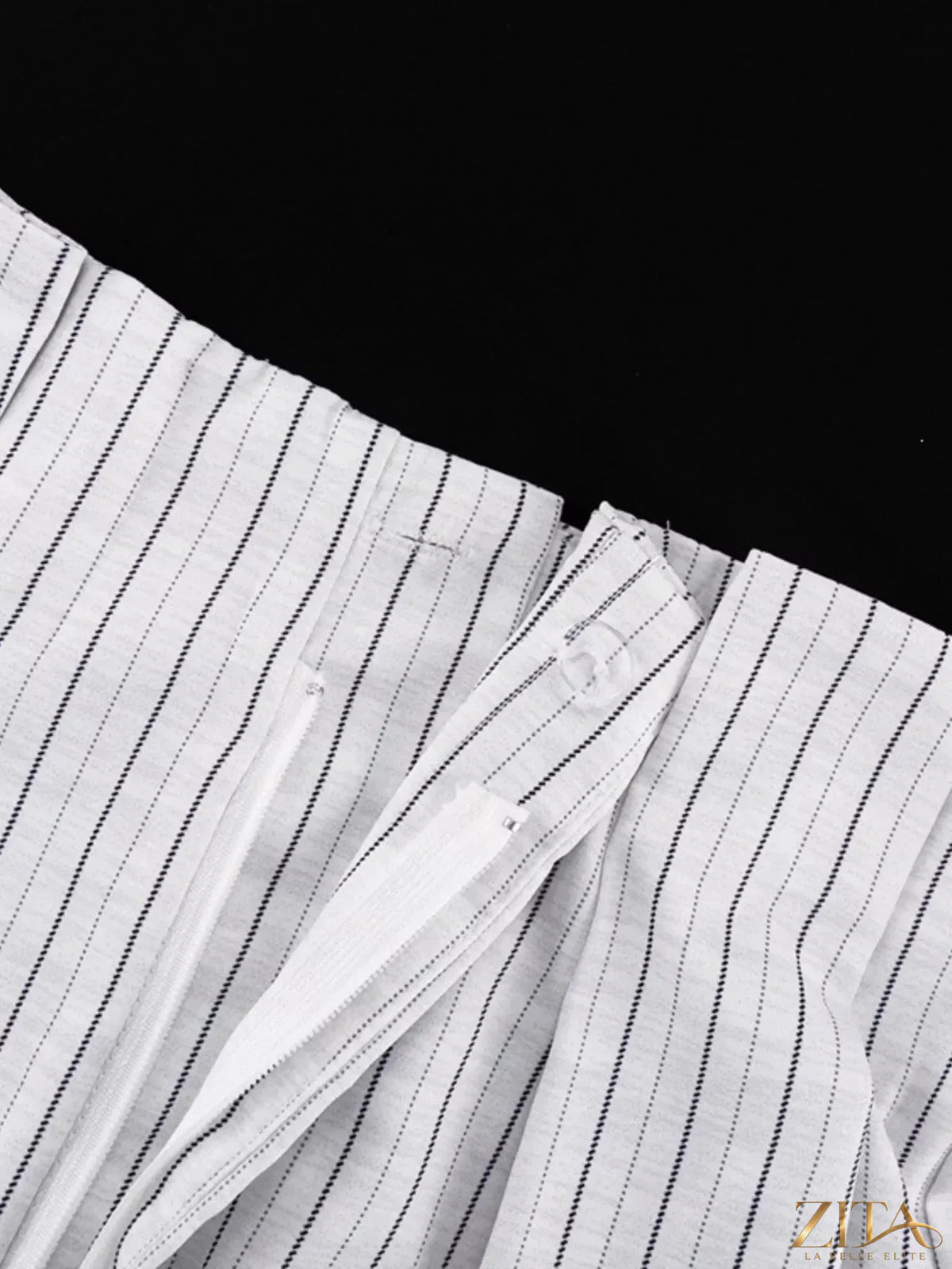 Zita La Belle Elite pinstripe cropped blazer and pleated shorts set displayed on a mannequin, stylish and tailored for a chic look.