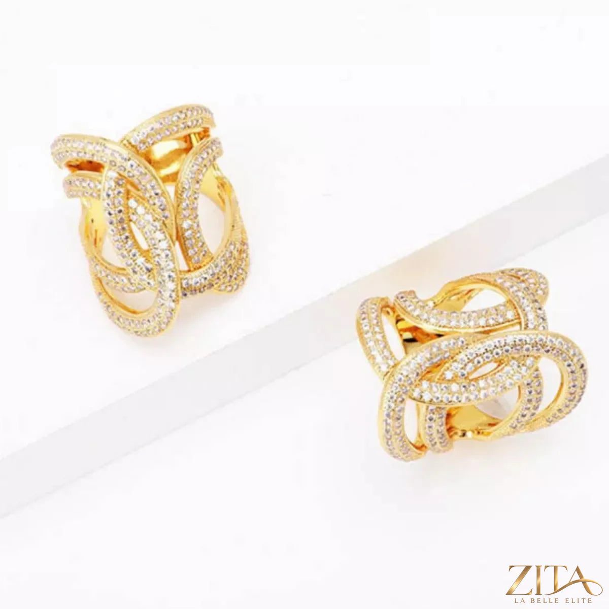 18K gold-plated zircon interwoven ring by Zita La Belle Elite, featuring sparkling zircon stones and intricate band design.