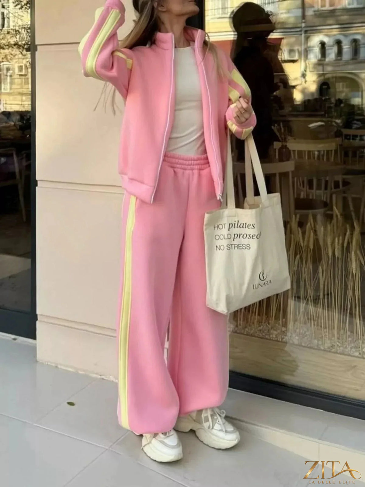 Zita La Belle Elite contrast striped zip-up top and matching pants set, featuring bold color blocks and a sporty fit.