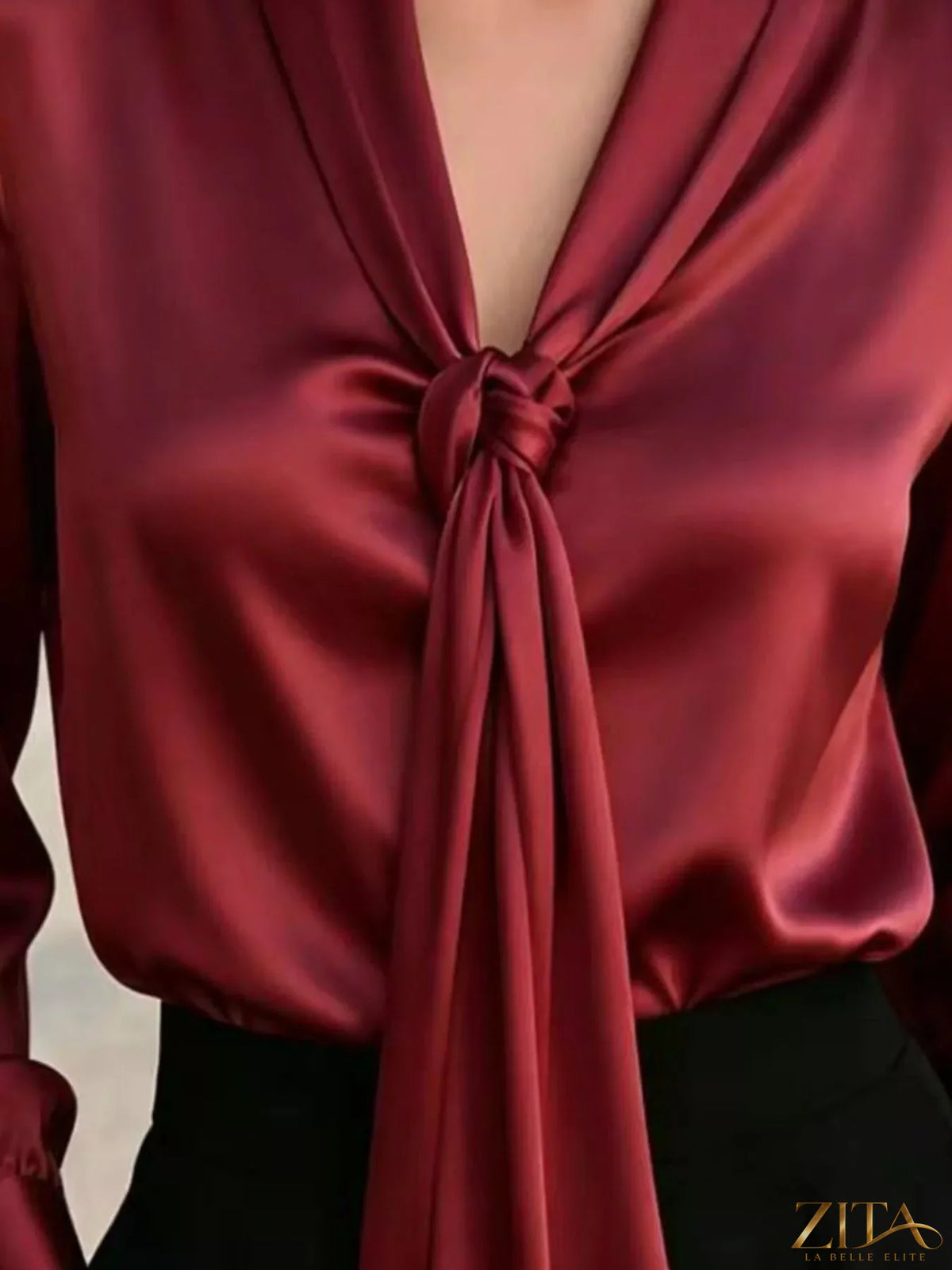 Zita La Belle Elite satin blouse with front tie detail, featuring a stylish and elegant design in smooth, shiny fabric.