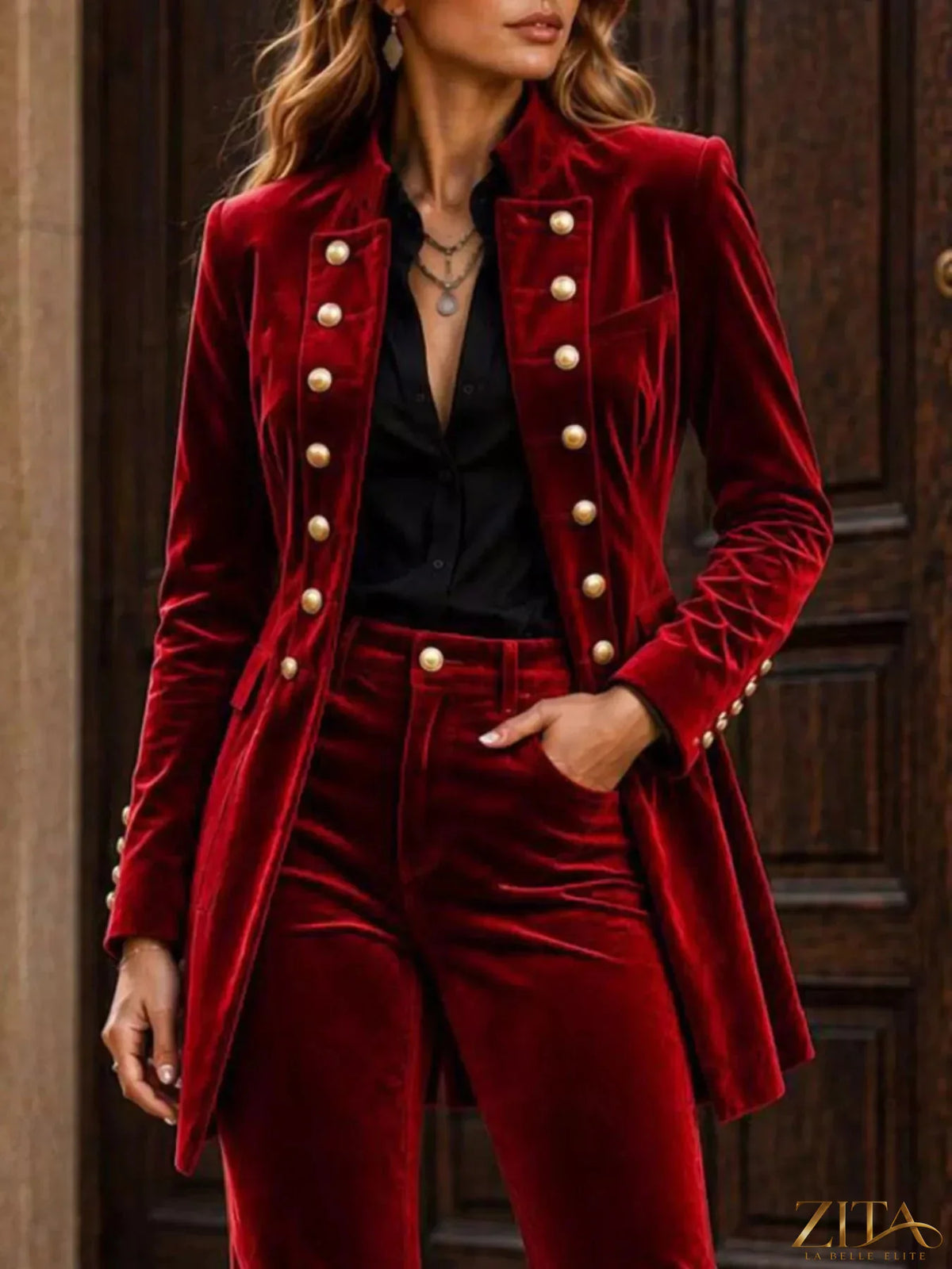 Velvet double-breasted blazer and flare pants set by Zita La Belle Elite, stylish formal wear with a luxurious texture.
