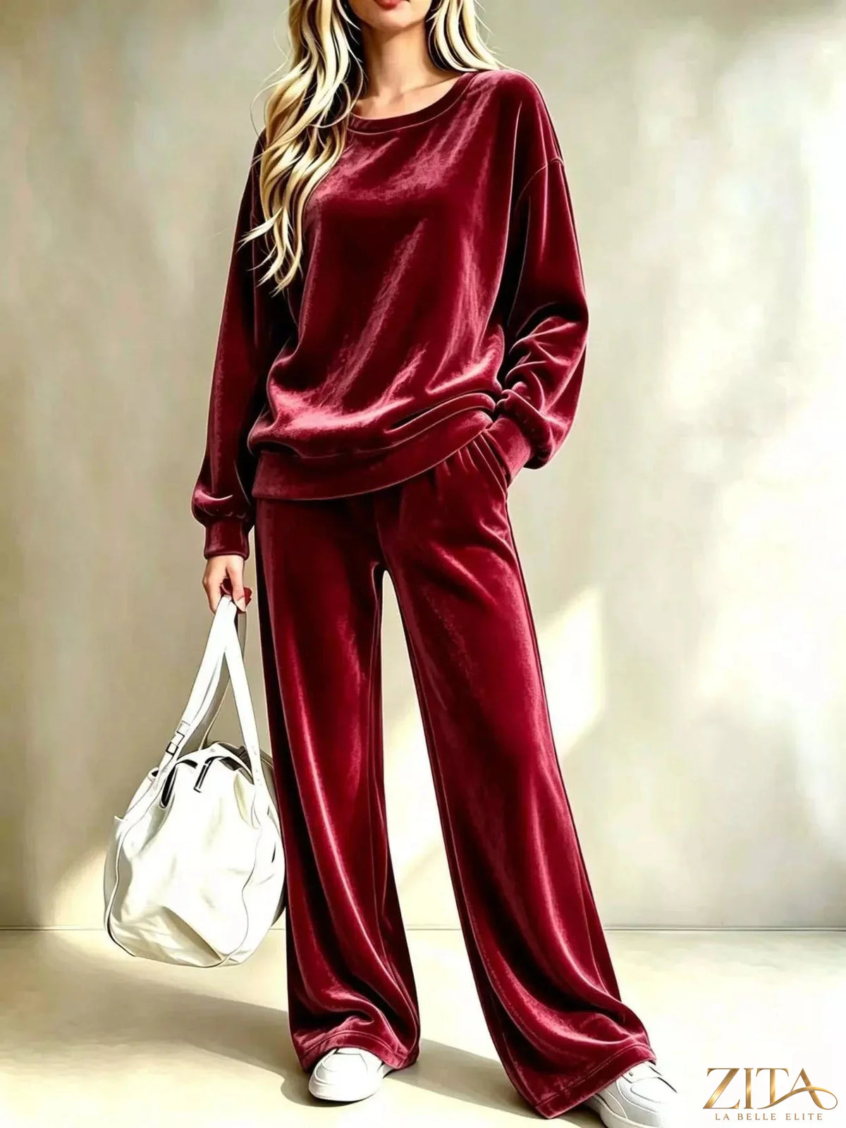 Plus size velvet top and wide-leg pants set by Zita La Belle Elite, featuring dropped shoulders and a luxurious fabric finish.