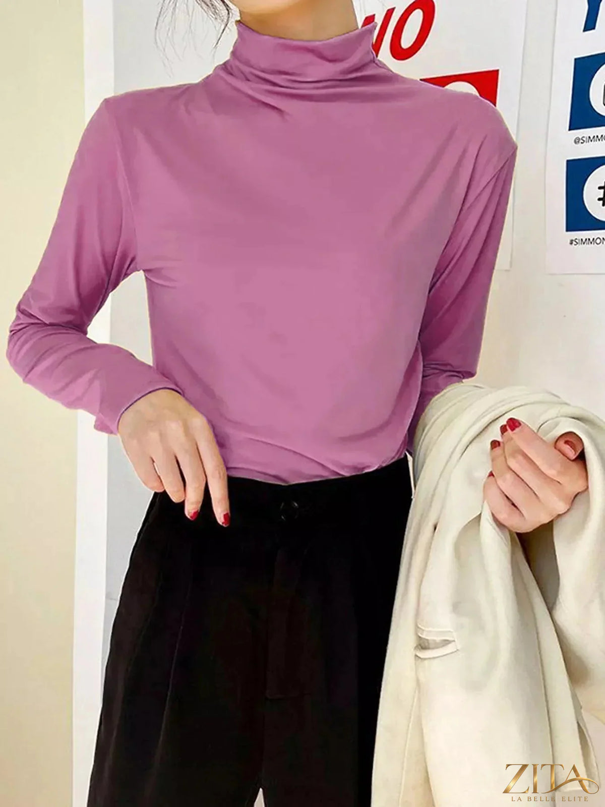 Solid color Trendsi turtleneck long sleeve T-shirt, showing the fitted design and soft fabric in a neutral tone.