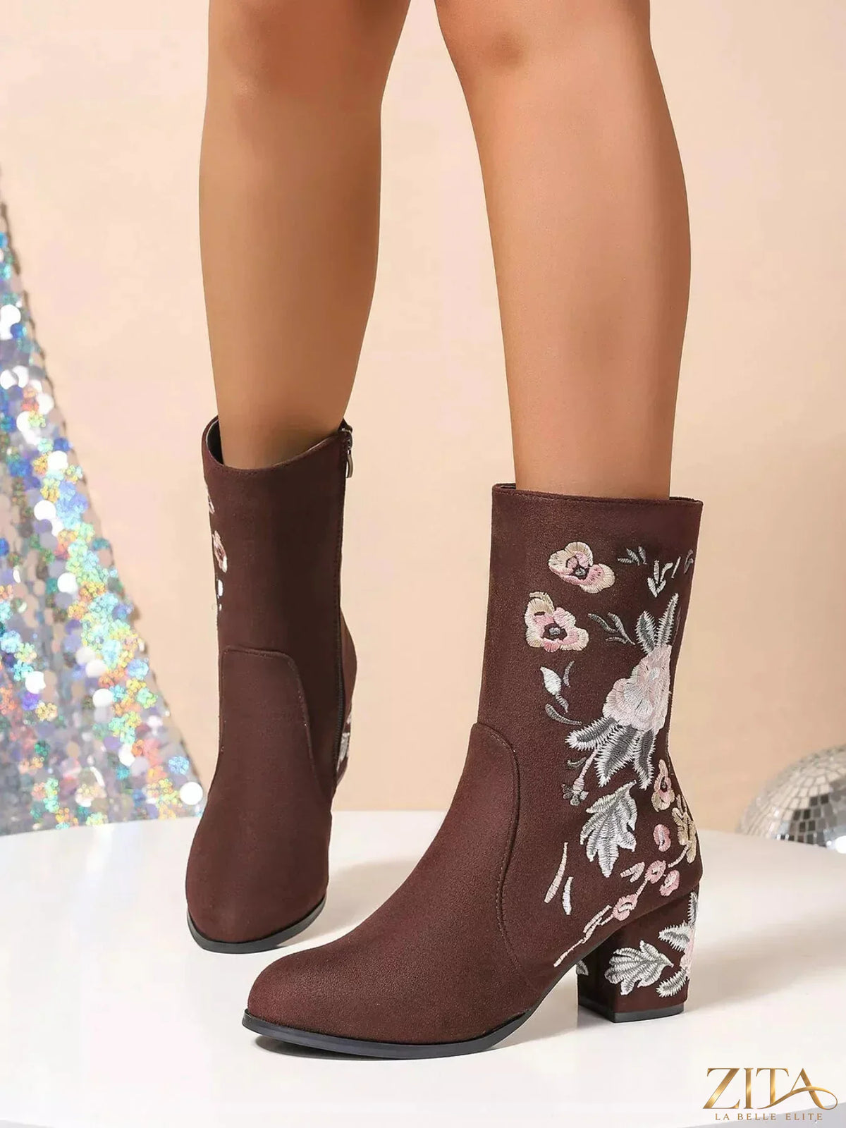 Floral embroidered block heel boots by Zita La Belle Elite featuring colorful flower patterns and stylish ankle-high design.