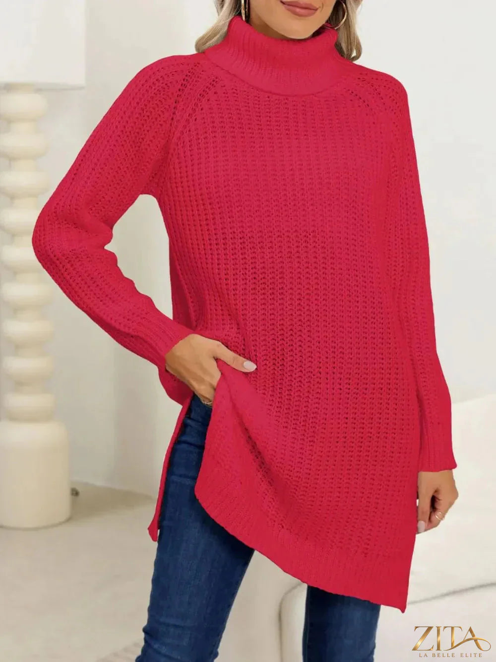 Black slit turtleneck long sleeve sweater by Trendsi, featuring a fitted design and stylish side slit detail.