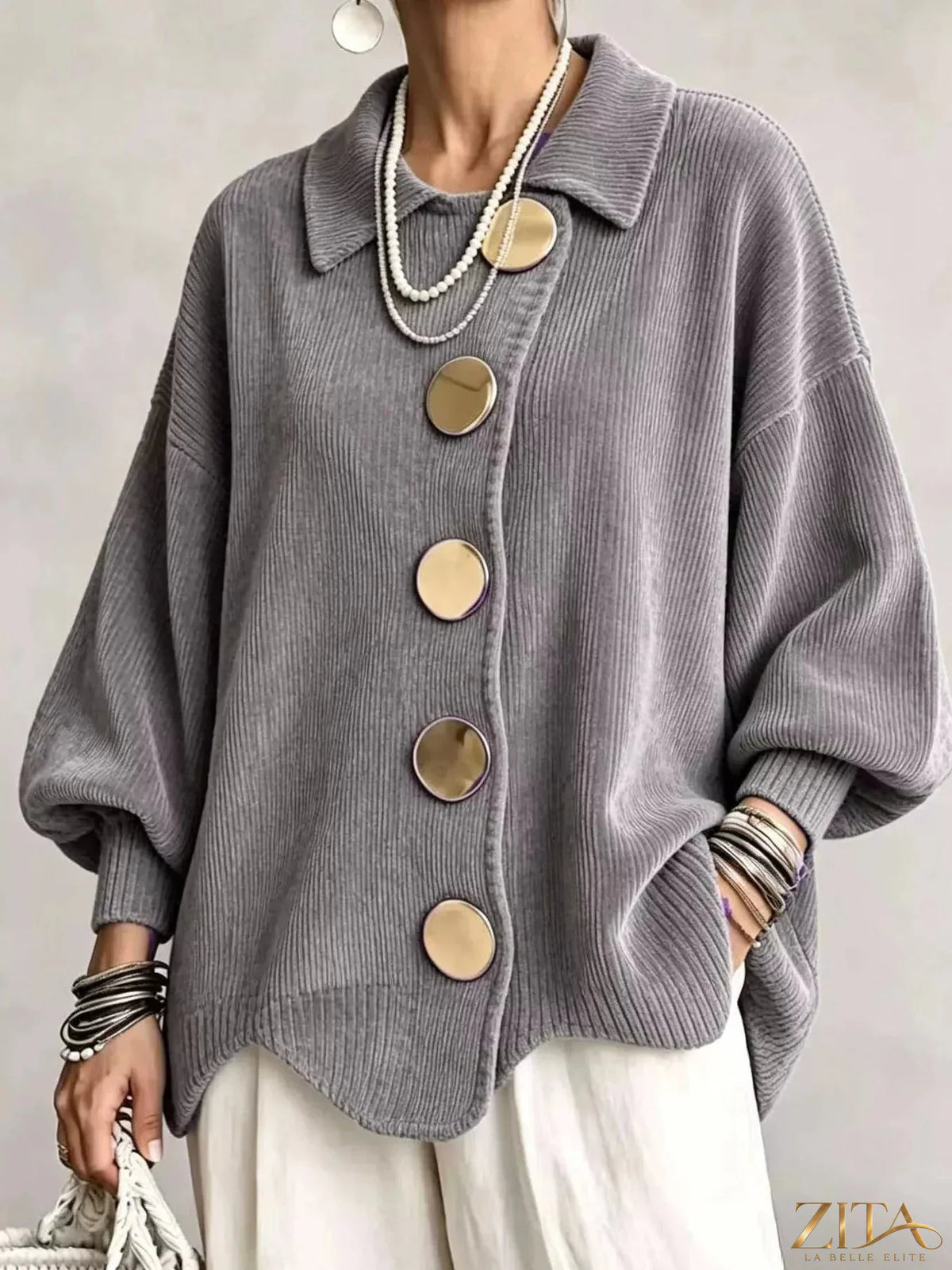 Plus size ribbed knit cardigan with gold buttons by Zita La Belle Elite, showing the front view with detailed ribbed texture and gold accents.