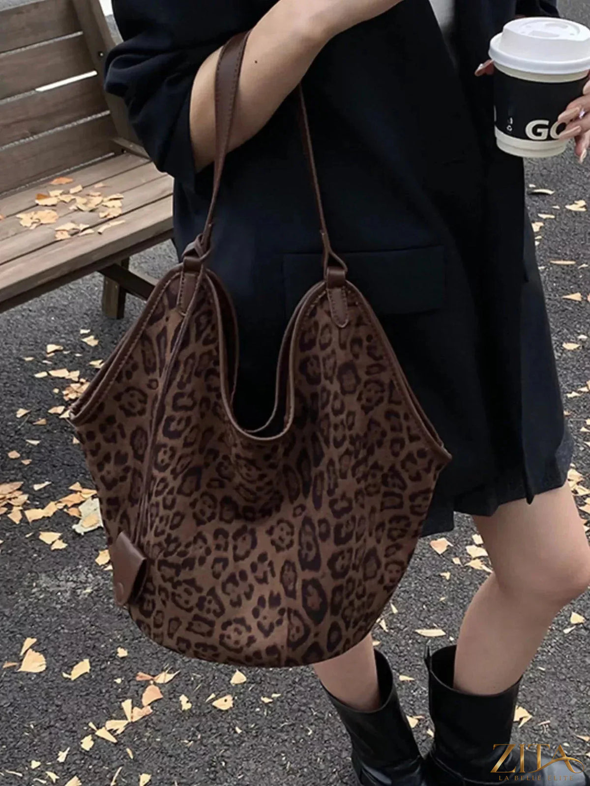 Zita La Belle Elite leopard print large tote bag on bed, showcasing spacious design and stylish animal print pattern.