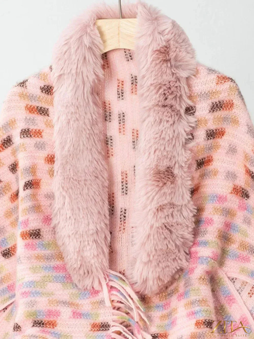 Fuzzy open front fringe poncho by Trendsi featuring a cozy, textured fabric with fringe detailing along the hem.