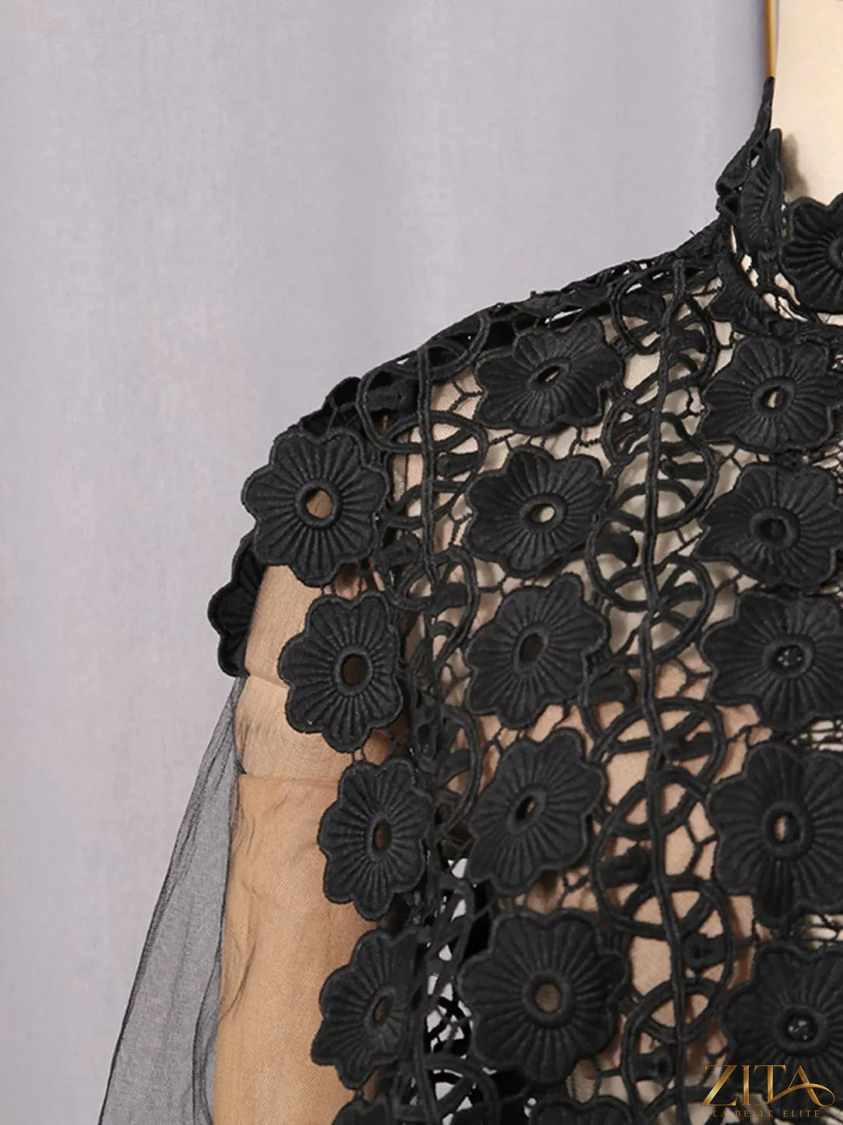 Lace sheer sleeve mini dress by Trendsi featuring delicate lace fabric and long transparent sleeves on a stylish fit.