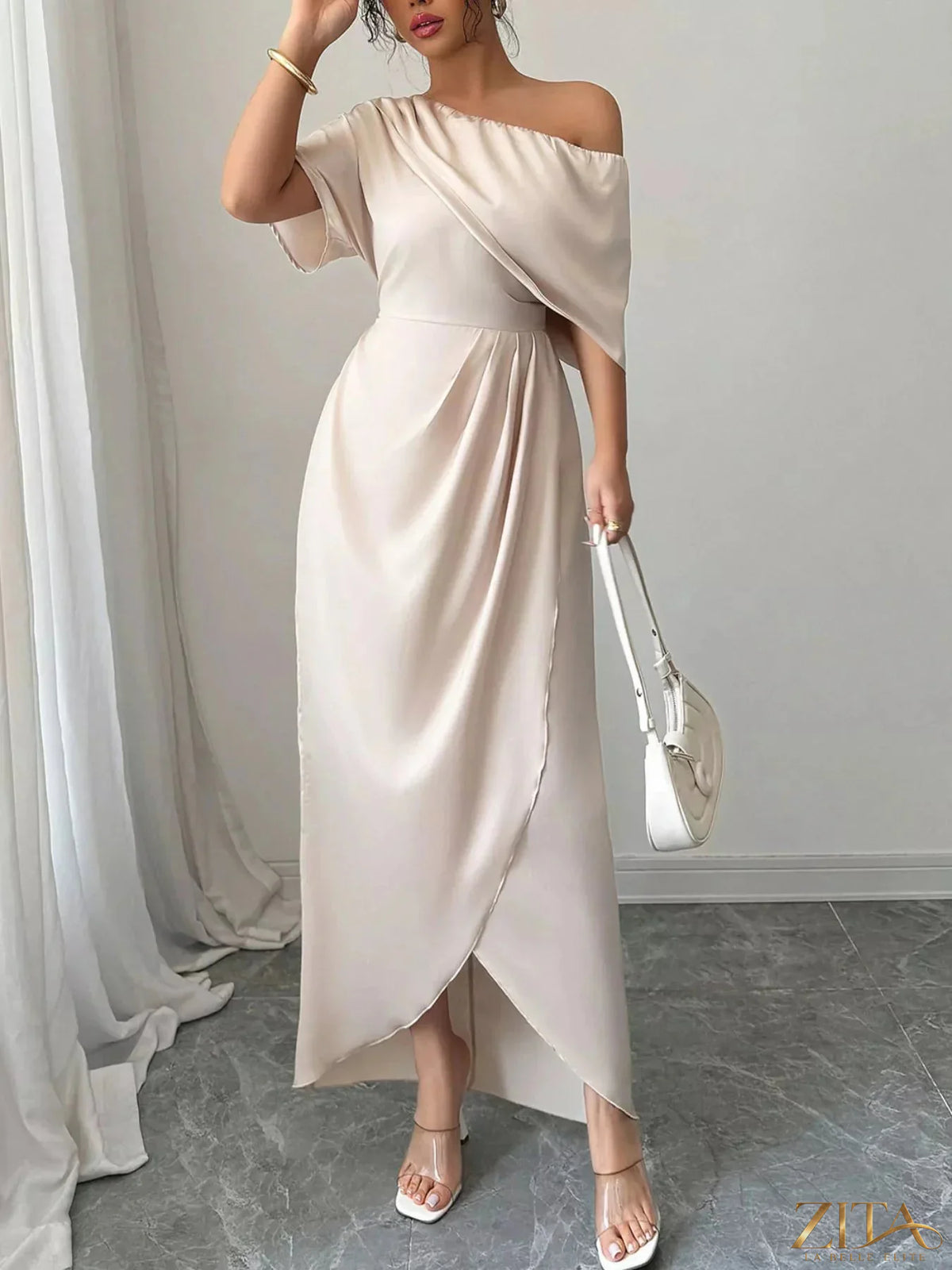 Elegant one-shoulder satin maxi dress by Trendsi featuring a flowing silhouette and sleek design, perfect for formal occasions.